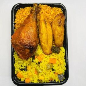 a plate of rice with chicken